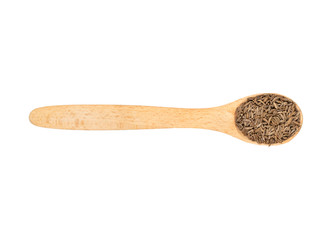 Dry cumin in spoon