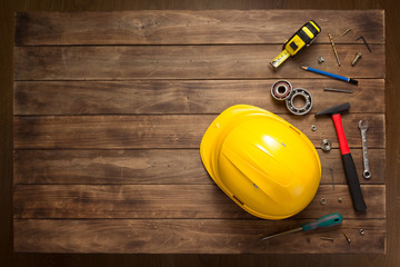set of tools and instruments at wooden table