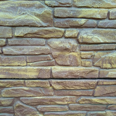 brown-golden stone background. stone texture wall. banner on page, cover, and website