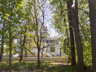 Cool house behind a stylish fence