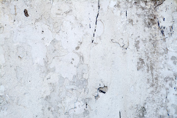 Old concrete wall with rust and cracks