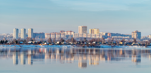 Winter. Beyond the river Kama, one of the areas of the city of Perm. - obrazy, fototapety, plakaty