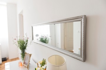 wallway mirror on wall. decorative mirrow on wall.