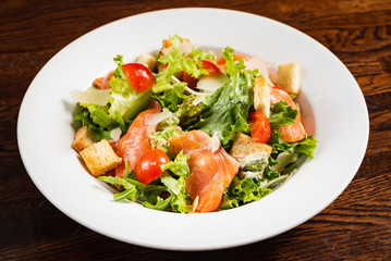 caesar salad with salmon fish