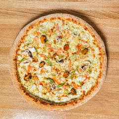 italian pizza on the wooden background