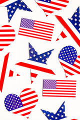 American Independence day background with blue, white and red mixed stars and hearts. Celebration of American independence day, the 4th of July (the Fourth of July). Holiday concept. With copy space. 