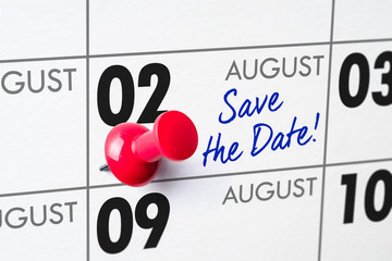 Wall calendar with a red pin - August 02