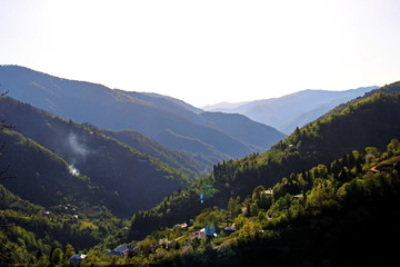 Fototapeta na wymiar Photo of Village in the mountains of Georgia, Adjara, spring
