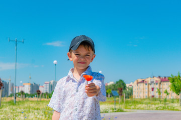Fototapeta premium Little boy walking in the new Park
