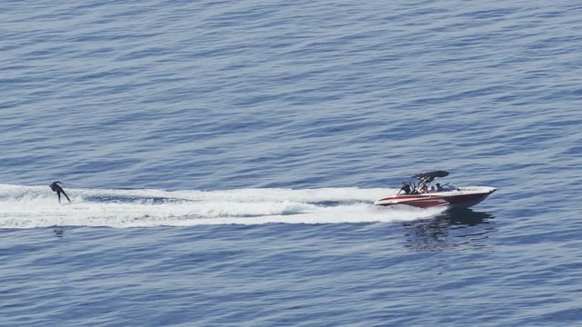 Man riding on a jet ski. Top view.