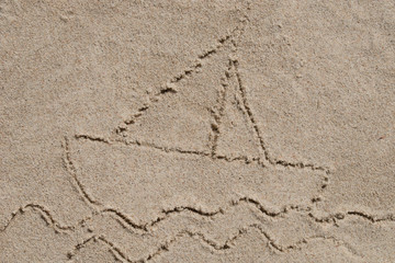boat on water - drawing on sand