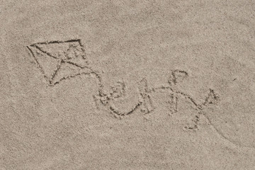 kite - drawing on sand