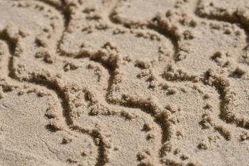 wave pattern - drawing on sand