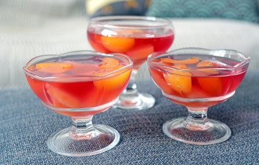 Jelly with fruit in glass bowl