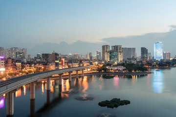 Obraz premium Aerial skyline view of Hanoi at Hoang Cau lake. Hanoi cityscape by sunset period
