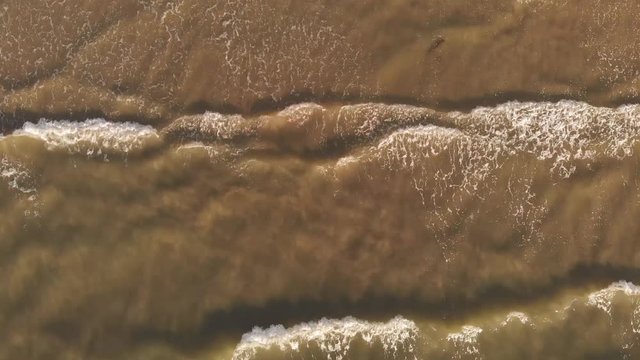 Footage of Beach wave hit on rock seaside view from top