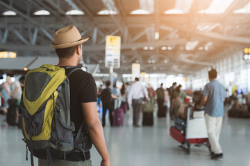 Young traveler man in the airport
