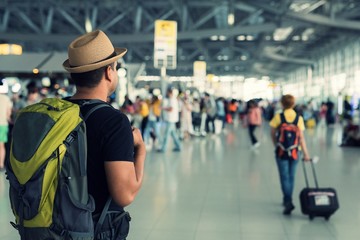 Young traveler man in the airport