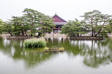 Fototapeta na wymiar Historical building on lake at Gyeongbokgung Palace in Seoul South Korea Asia