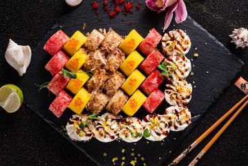 sushi on the black background