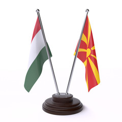 Hungary and Macedonia, two table flags isolated on white background. 3d image