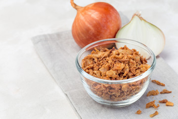 Fried onion in glass, topping for hot dog, fast food, horizontal, copy space
