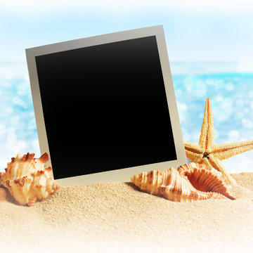 photo frames on the sea sand on the beach background