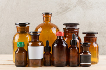 Retro pharmacy - vintage pharmacy bottles on wooden board