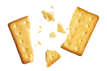 Crushed dry cracker, isolated on white background