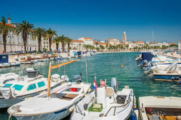 Obraz premium City center, cathedral tower, boats and yachts in marina of Split, Croatia, largest city of the region of Dalmatia and popular touristic destination, beautiful seascape