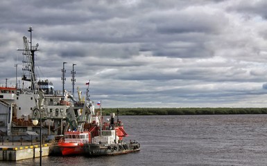tugboat and ship