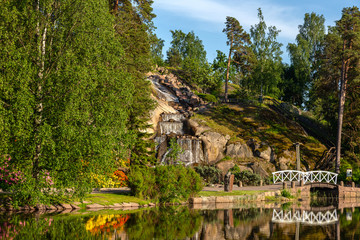 Fototapeta na wymiar blooming rhododendrons in Sapokka landscaping park Kotka Finland