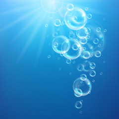 Realistic transparent floating soap bubbles. Design element for advertising booklet, flyer or poster