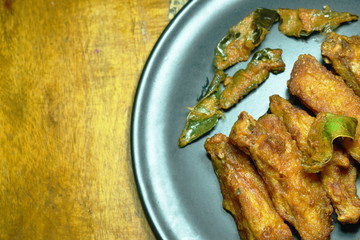 crispy fried chicken wing with lemon grass on plate