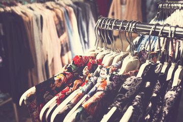 Women clothes in shopping mall. Fashion store. Fashion clothes. Women clothing.