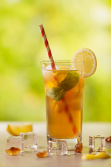 Iced tea with lemon and ice cubes