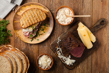 Ruben sandwich. New York sandwich with pastrami, sauce 1000 islands and sauerkraut.