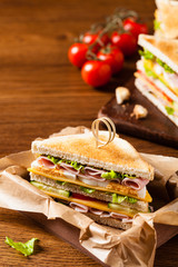 Delicious toast sandwich with ham, cheese, egg and vegetables.