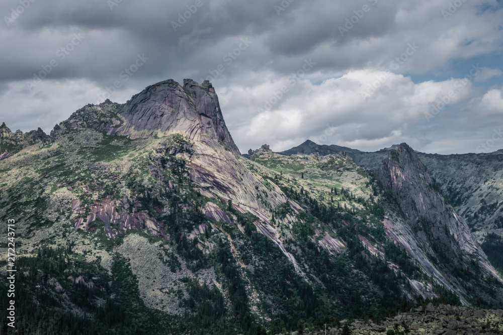 Wall mural view of a mountain valley on a cloudy day