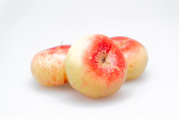 Peaches on a white background..