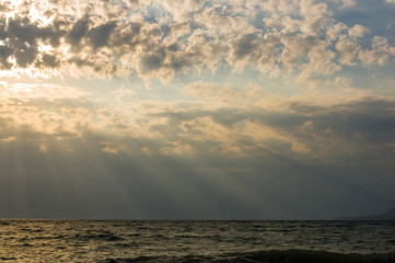 Amazing sea sunset, the sun, waves, clouds