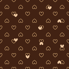 Seamless pattern of hearts. Festive pattern with small hearts. Background from hearts. Holiday pattern.