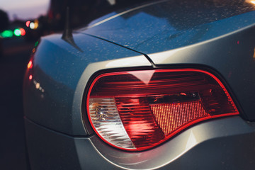 Close up projector Taillight of the modern and elegant car, automotive part concept.