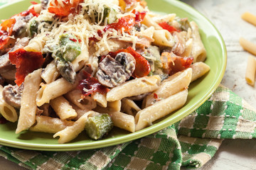 Penne pasta with asparagus and mushroom
