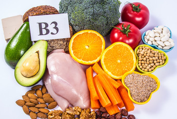 Nutritious products containing vitamin B3 (PP, niacin) and other natural minerals, concept of healthy nutrition. White background.