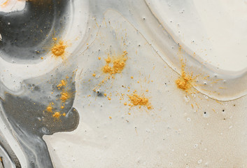 abstract marbleized effect background. black, gray and white creative colors. Beautiful paint with the addition of gold.