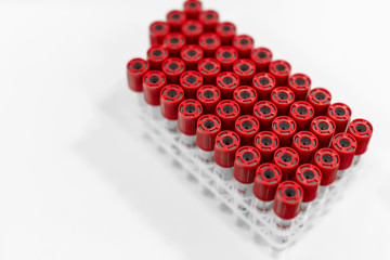 Closeup set of sterile vacuum test-tubes for blood sample. Science and medicine concept