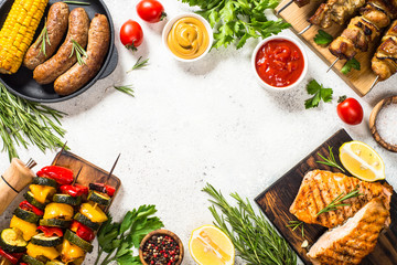 Barbeque dish - Grilled meat, fish, sausages and vegetables.