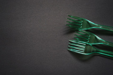 fork and knife on black background