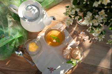 Mint jasmine tea with honey in the country